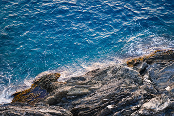 Sea wave crashing on rock