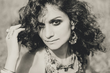 Obraz premium beautiful young stylish woman close up portrait with eastern accessories