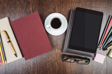 Creative workspace with empty tablet