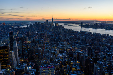 New York City - Manhattan downtown skyline skyscrapers at night - View from Observation Deck on the Empire State Building at twilight. USA.