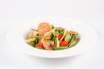 Baby spinach, dry sausage, matured cheese, roast tomatoes, thyme-balsamic vinaigrette salad on a white background