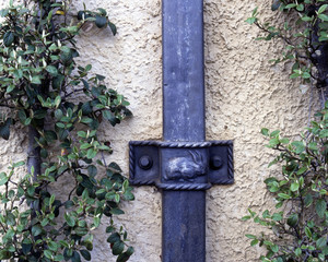 An antique decorated lead rainwater downpipe
