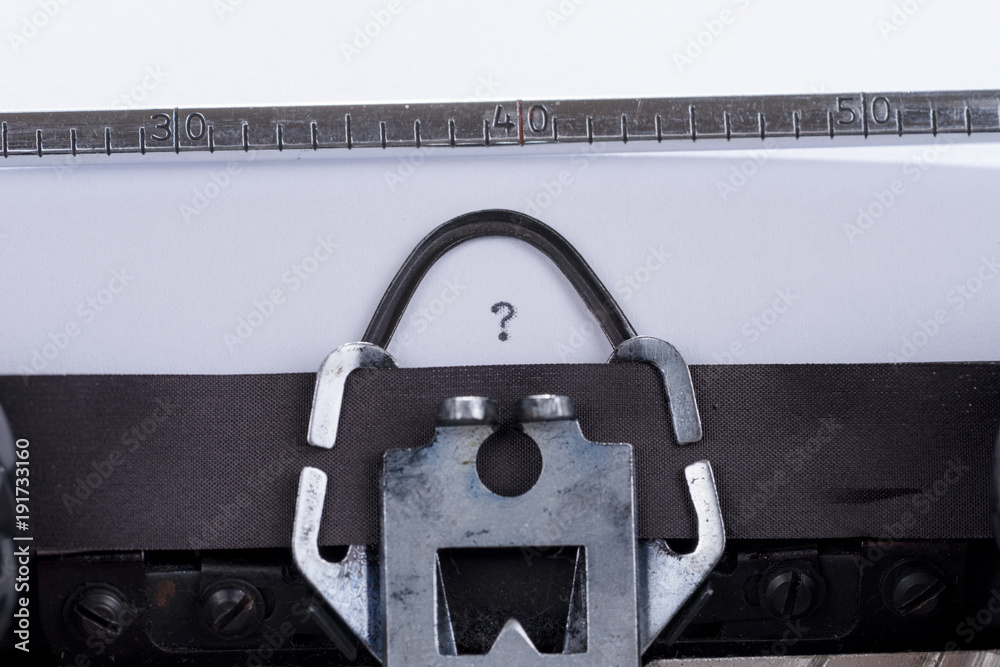 Fototapete Concept image with question mark written on an old retro typewriter