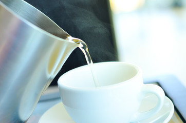 Hot tea time in holiday,break time or relaxing time outside,select focus.