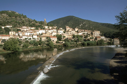 Europe, France, Languedoc-Roussillon, Haut Languedoc, Herault 34, Roquebrun, River Orb, Hillside village by river