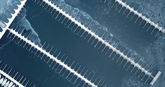 Aerial footage of frozen Frognerkilen Marina in Oslo, Norway in winter 2018
