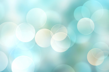 Light blue blurred background.