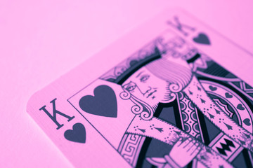 King of hearts macro, fortune-telling cards. Mystic card ritual, prediction of female love fortune, close up.