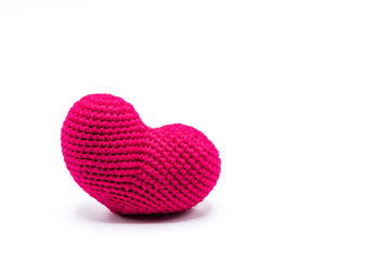 Red heart shape made from Yarn on white background