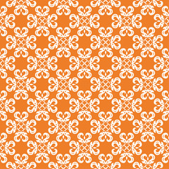 White floral ornament on orange. Seamless pattern