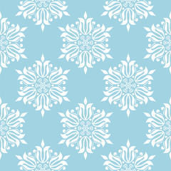 White floral seamless pattern on blue background