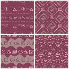 Set of violet seamless backgrounds with geometric patterns