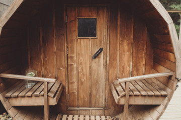 Beautiful wooden sauna outside a house