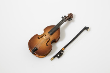 Fototapeta na wymiar Cello instrument composition in a white background