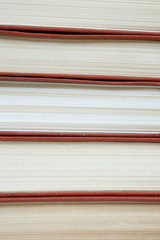 Pile of old books stacked on top of each other