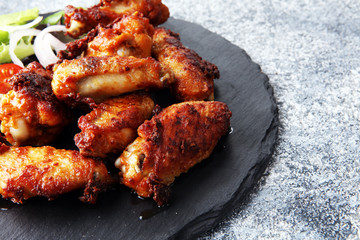 crispy barbecue chicken wings bbq on grey background