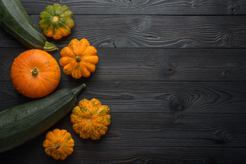 Composition of pumpkin on a wooden background