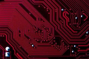 Macro picture of red printed circuit board - PCB