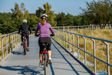 Healthy lifestyle - people riding bicycles