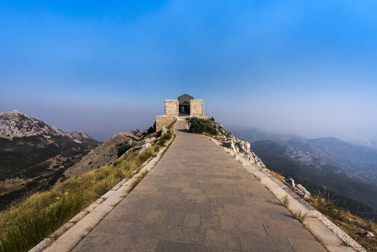 Lovcen National Park - Steep path to Njegusi mausoleum surrounded by mountains, Cetinje municipality, Montenegro, Europe