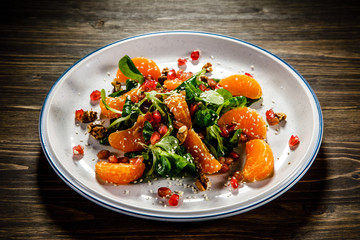 Vegetable salad on wooden background