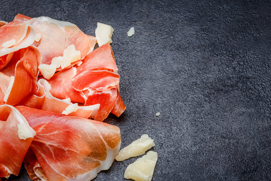 Italian prosciutto crudo or spanish jamon. Raw ham on white background.