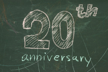20 Year Anniversary logo on chalkboard written by color shocks.