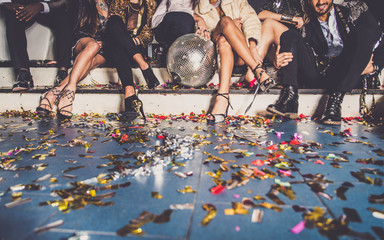 Friends having party in a nightclub - obrazy, fototapety, plakaty