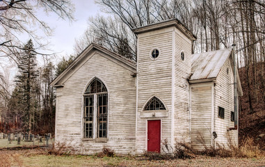 Abandoned White Church in Woods