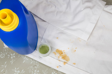 White shirt with curry gravy stain and concentrated liquid detergent