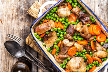 Meat baked with carrot and green peas