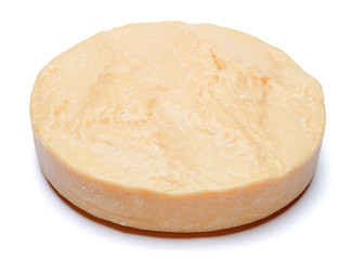 Whole round Head of parmesan or parmigiano hard cheese on white background