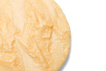 Whole round Head of parmesan or parmigiano hard cheese on white background