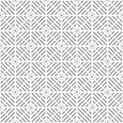 Fototapeta premium Gray geometric ornament on white background. Seamless pattern