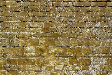 Old stone garden wall surface texture background at Chasleton House, Oxfordshire, UK