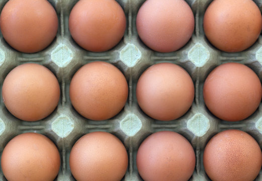 A tray of fresh free range eggs. Shallow depth of field.