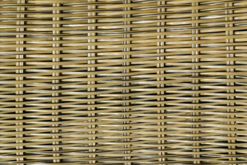 Plastic wicker effect garden chair detail full frame close up