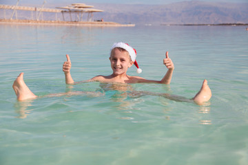 Happy little Santa at the Dead Sea, Israel