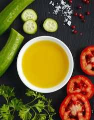Olive oil, fresh vegetables, herbs and spices
