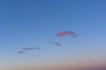 Fototapeta na wymiar Sunrise sky with orange/purple clouds