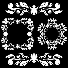 Floral decorations. Ornamental frames and dividers on black background