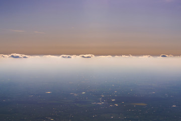 Horizon line with clouds senn from plane window