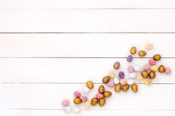 Easter composition: chocolate eggs on a white background