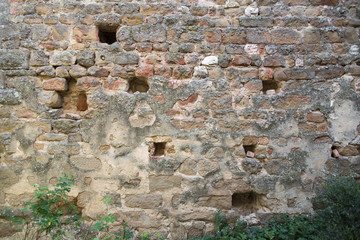 Stone wall with missing pieces