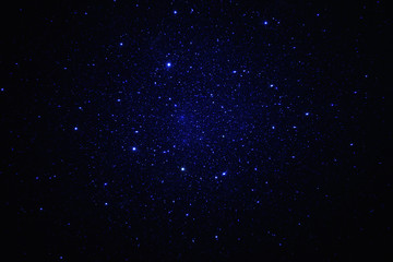Fototapeta na wymiar Starry sky fractal with distant planets on dark background