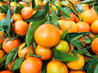 Fresh mandarin oranges, in market , background