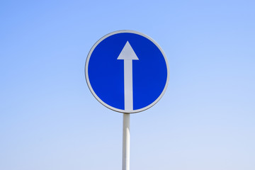 Traffic sign straight ahead. prescriptive sign. Sign on a blue sky background.