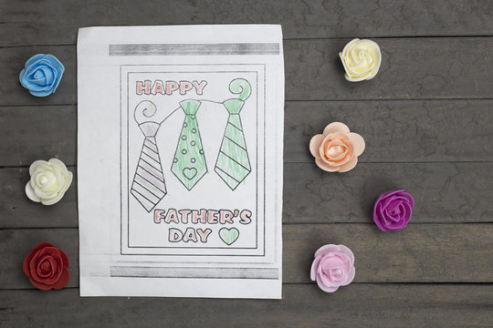 Childs drawing with multi-colored flowers. Fathers day.