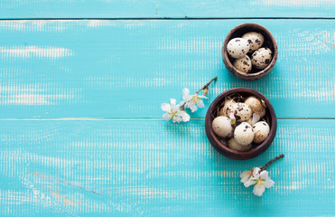 Quail eggs in a clay pots