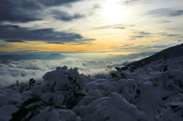Fototapeta na wymiar Winter inversion in mountains during sunset, Little Fatra, Slovakia